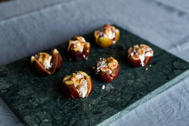 istock figs stuffed with ricotta cheese, walnut and honey 1172908404