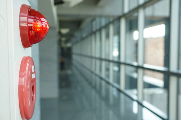 istock Alarm bells and warning lights for avoiding fire. Interior of Building in public place. The blurred background is the glass window. The location is in the corridor of the public place. 1172910880