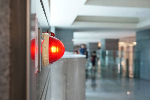 alarm bells and warning lights for avoiding fire. interior of building in public place. the subject is on the left. - department store shopping mall store inside of imagens e fotografias de stock