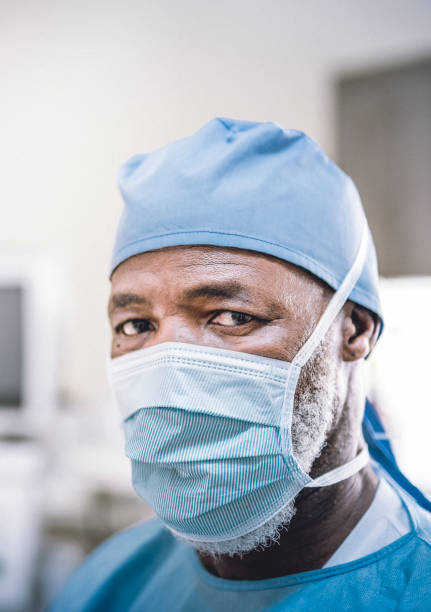 istock Portrait of doctor wearing surgical mask and cap 1172913402