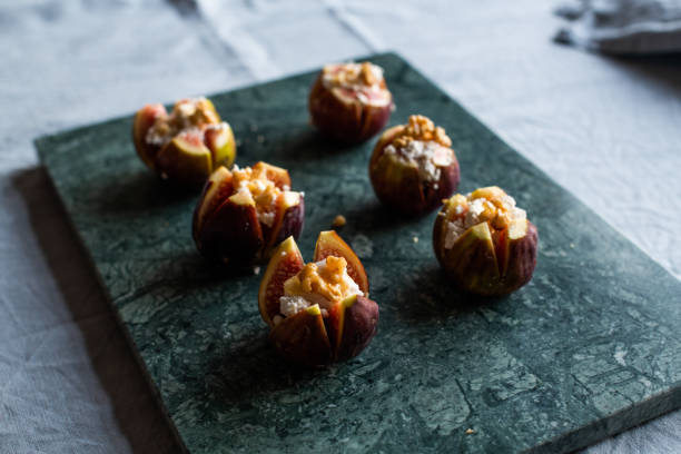 istock figs stuffed with ricotta cheese, walnut and honey 1172913548