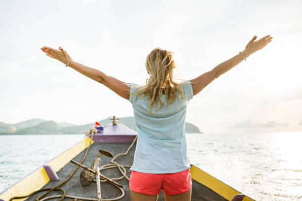 istock Rear view young women on a boat 1172913584