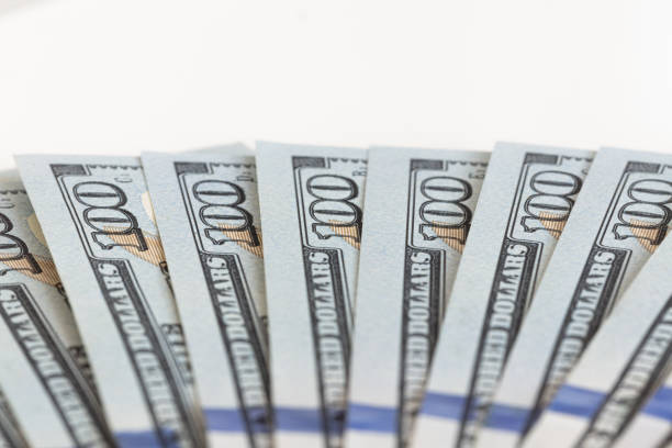 istock fan of 100 dollar bills 1172915485