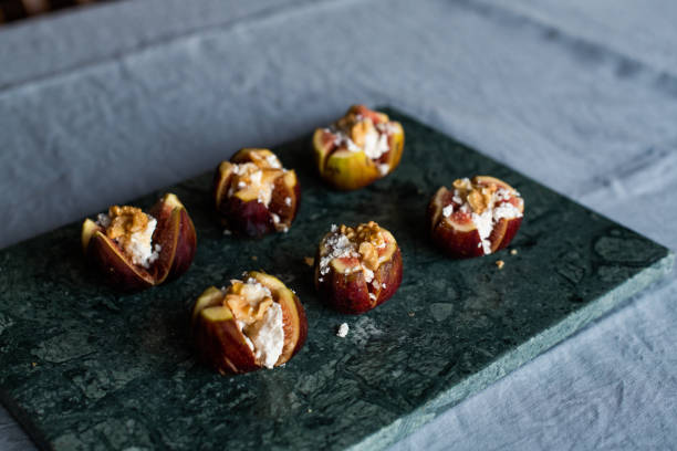 istock figs stuffed with ricotta cheese, walnut and honey 1172917733