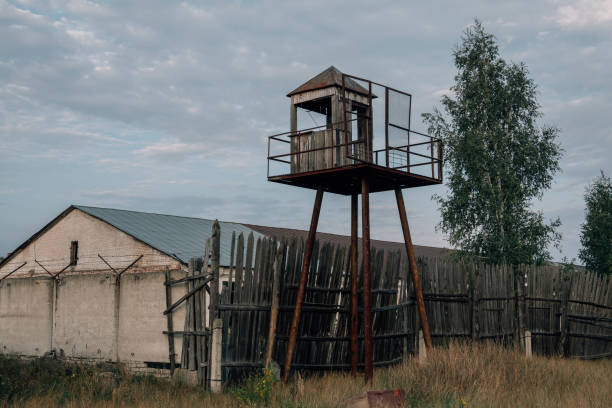 Old observation tower in abandoned Soviet Russian prison complex Old observation tower in abandoned Soviet Russian prison complex in Bor, Ramon district, Voronezh region rusty barb stock pictures, royalty-free photos & images