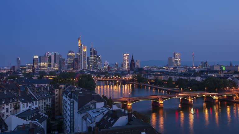 Aerial view of Frankfurt am Main skyline and River Main, night to day 4k time lapse