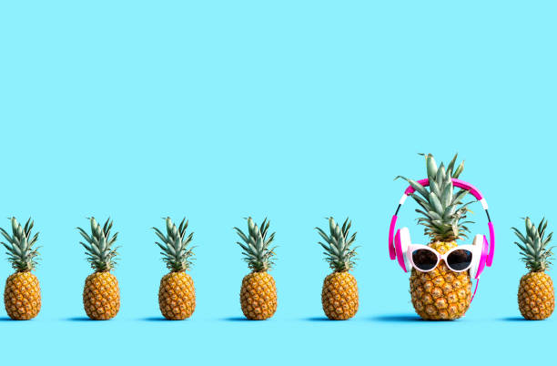 istock One out unique pineapple wearing headphones 1172941071