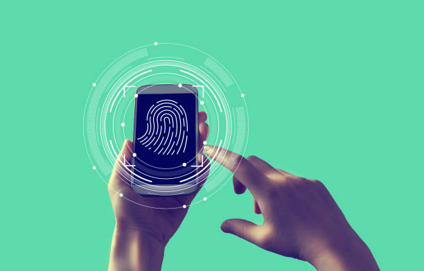 istock Fingerprint scanning theme with smartphone 1172941137