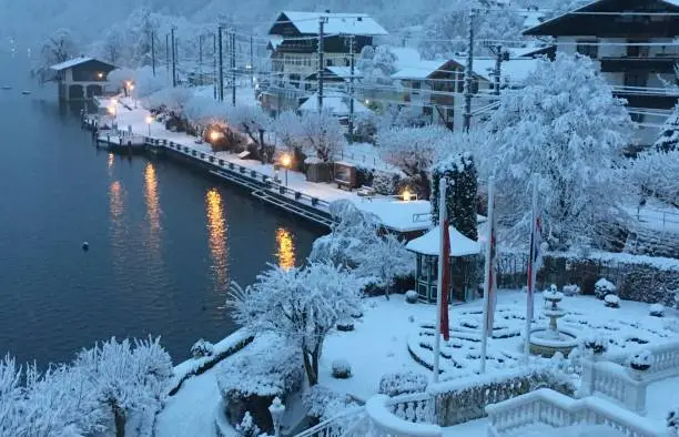 Snow covered lakeside village in Austria