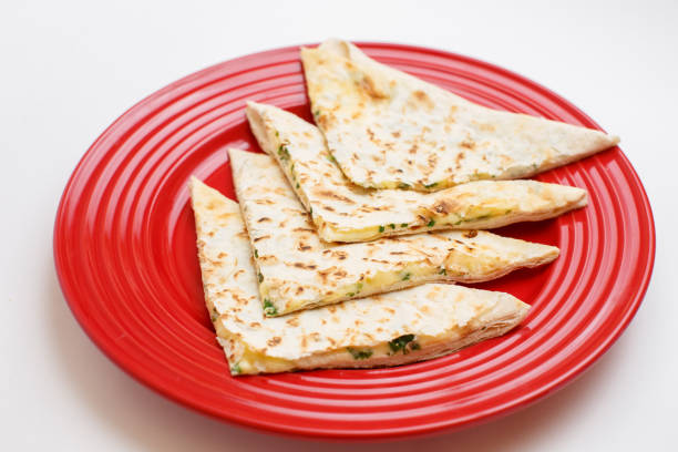 istock a cheese tortilla with a greens 1172945054