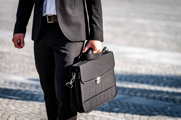 istock Businessman holding a briefcase 1172945110
