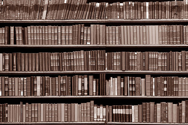 istock Old books on a library - sepia tone 117294543