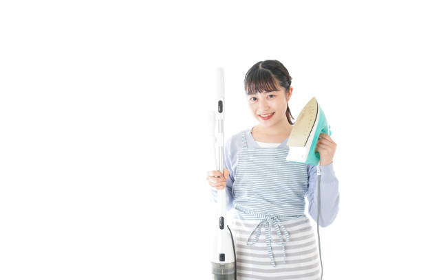 istock Young housewife doing housework with smile 1172946079