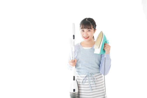 istock Young housewife doing housework with smile 1172946089