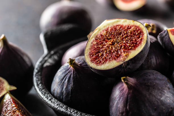 istock A few figs in a black bowl on an dark concrete table 1172947932