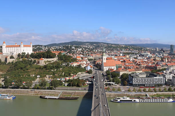istock Bratislava castle (left), Saint Martins cathedral (right) and Bratislava old town over Danube river. View from UFO view point, Slovakia. Elevation view. Place for text 1172948174