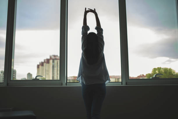 Woman stretching at home