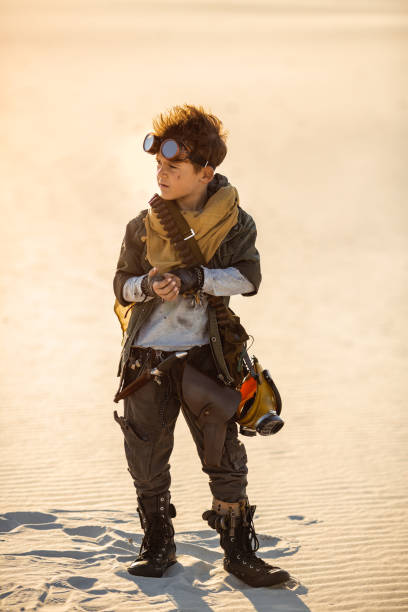 istock Post-apocalyptic Boy Outdoors in a Wasteland 1172950526