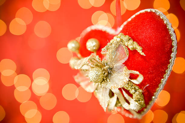 Christmas ornament in heart shape. Shallow depth of field. Focus in the middle of heart decoration. Canon 1Ds Mark III