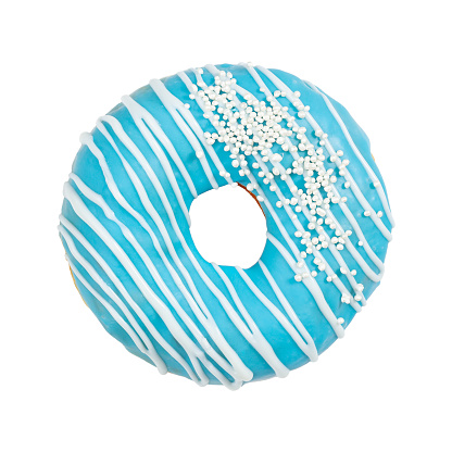 Donut with blue icing and sprinkles isolated on white background.