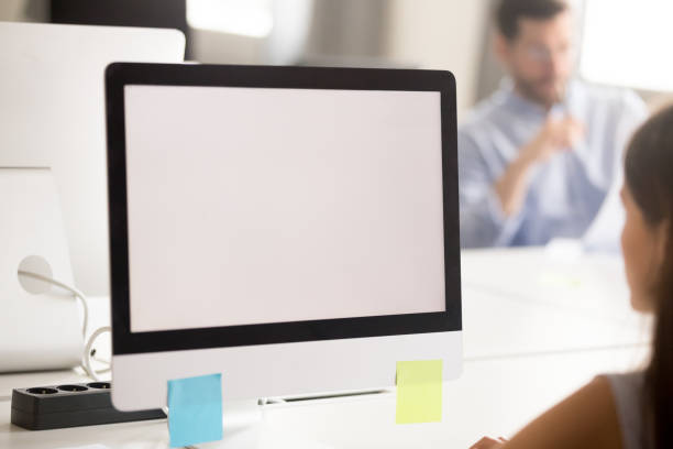 istock Close up of female working in office looking at screen 1172966571