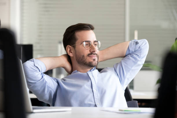 istock Thoughtful male worker relax in office chair dreaming 1172966664
