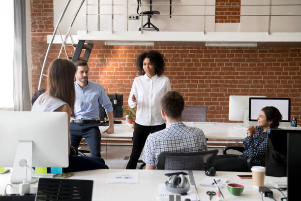istock Multiracial colleagues brainstorm discussing ideas in coworking space 1172966722