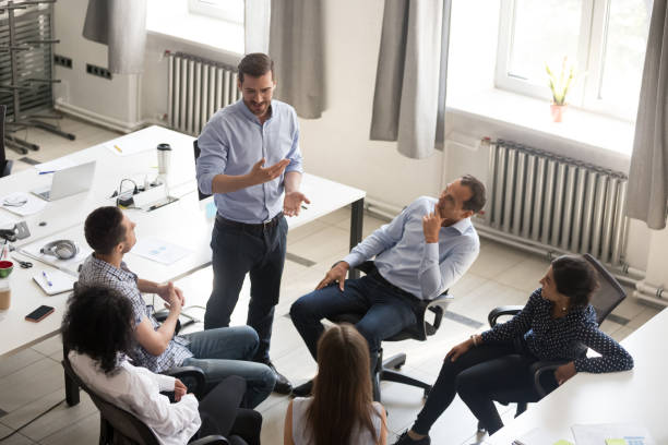 istock Diverse employees brainstorm involved in teambuilding meeting 1172966768