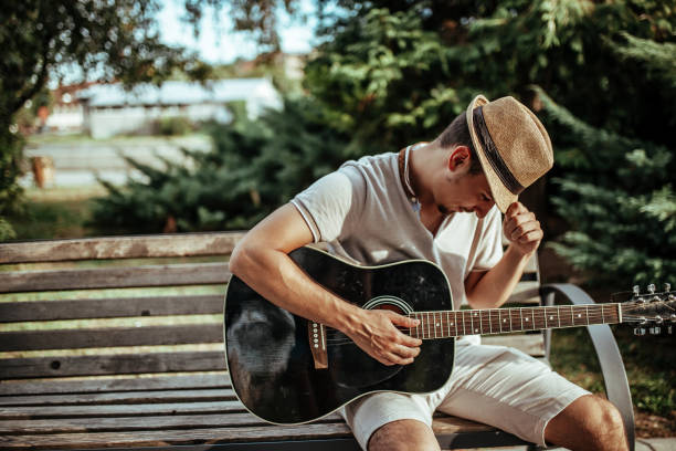 istock Musician playing acoustic guitar 1172967597