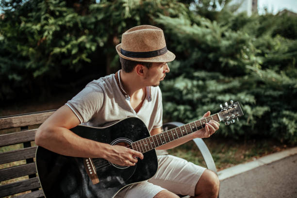 istock Musician playing acoustic guitar 1172967996