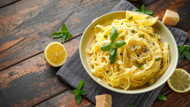 istock Pasta al Limone, Lemon with basil and parmesan cheese 1172970378