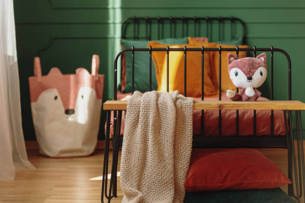 istock Fox shape like pillow and bag with fox head in elegant bedroom interior 1172971315