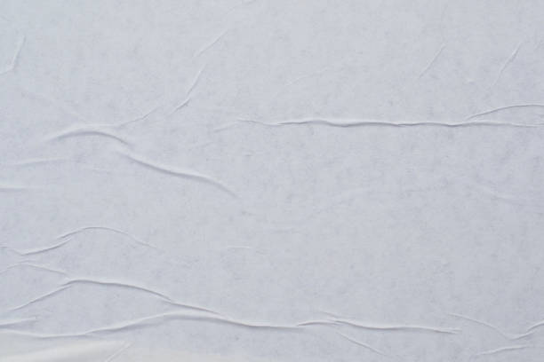istock White creased poster texture. Abstract background. 1172973753