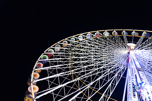 Ferris Wheel in Bordeaux in France photographed by night