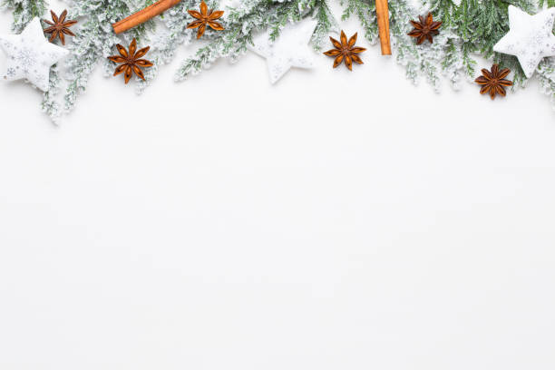 istock Christmas white Fir tree branches with stars decorations. 1172975585