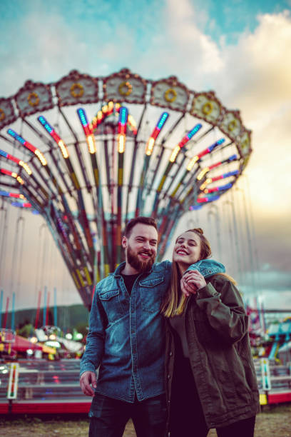istock Couple Enjoying Theme Park 1172976390