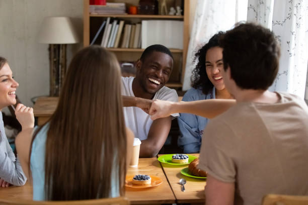 istock Happy black guy bumping fists with buddy. 1172977548