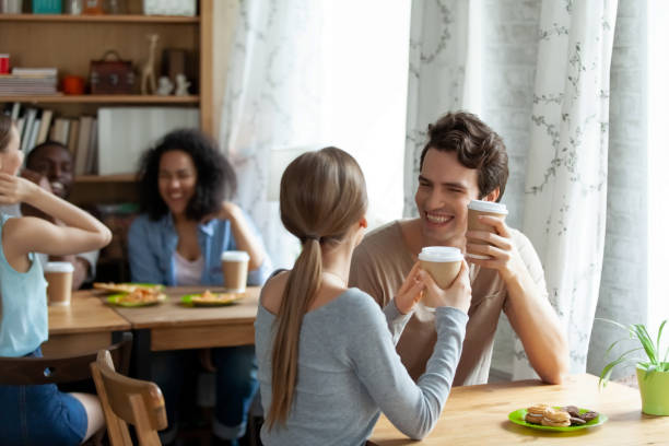 istock Happy couple dating, drinking coffee in cafe. 1172977610