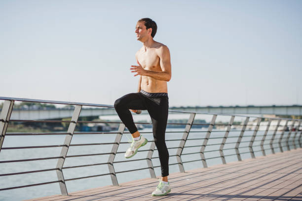 istock Young athlete man running outdoors 1172978098