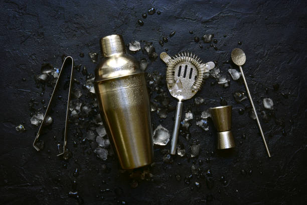 Set for making cocktail Set for making cocktail on a black slate, stone or concrete background. Top view with copy space. pub table top view stock pictures, royalty-free photos & images
