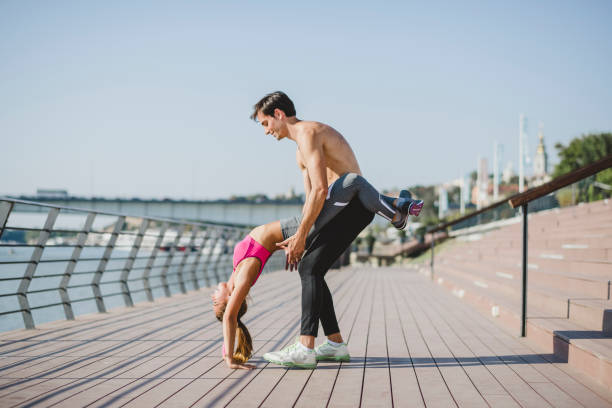 istock Athletic couple exercising outdoor 1172981278