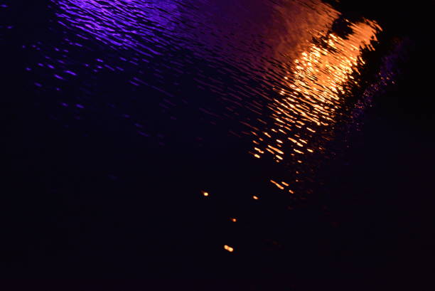 istock Glare and reflection of light on the water. 1172981376