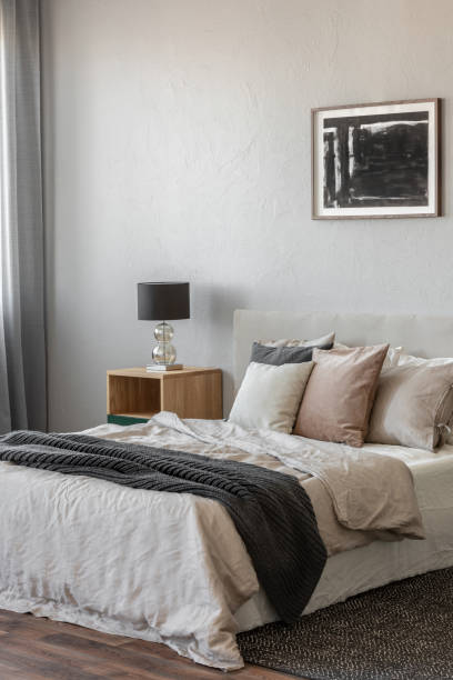 istock Trendy bedroom with comfortable king size bed in modern flat, real photo 1172982455