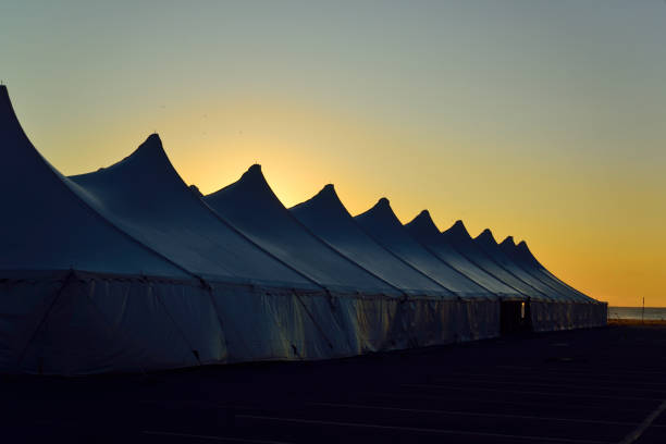 Ocean City, MD, i preparing for its primary fall event by erecting tents to house vendors and entertainment in its inlet parking lot,  But this could be the Roman army on the march into Britain