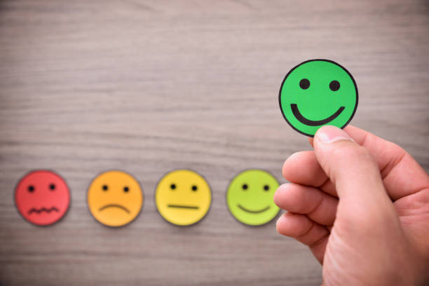 istock Hand taking a positive assessment on wood table top 1172984422