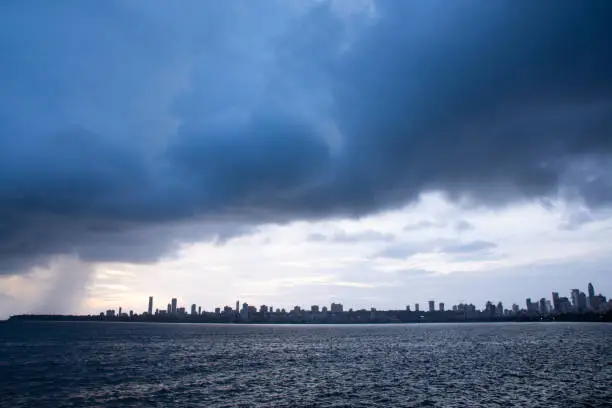 Monsoon clouds and heavy rainfall over Arabian sea in Mumbai city , Extreme clouds over Arabian sea in Mumbai. An extremely rare scenario or cloud porn over the Mumbai city in India