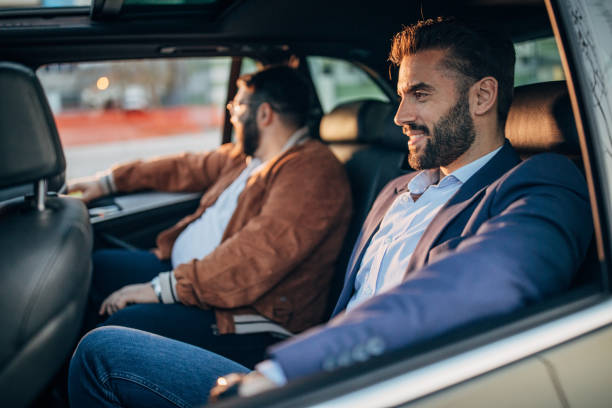 istock Two men driving in a car 1172986569