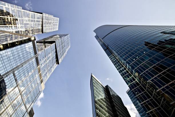 istock Office and residential skyscrapers on clear blue sky background. 1172987213