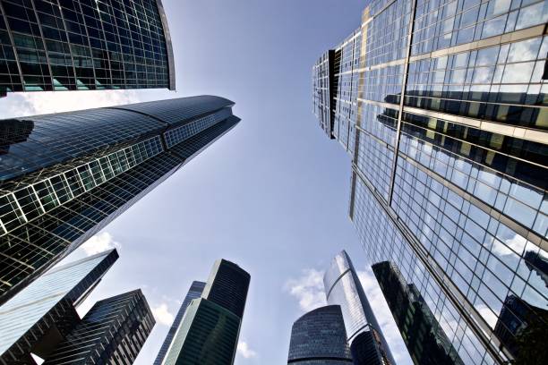 istock Office and residential skyscrapers on clear blue sky background. 1172987258