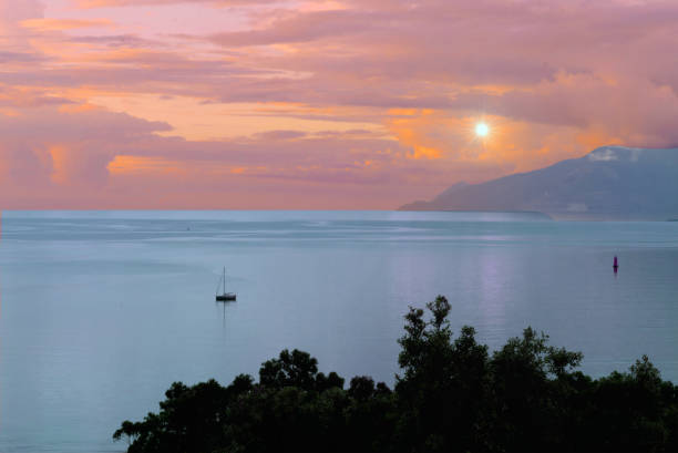 istock Lonely boat on the sea under a red evening sky 1172987276